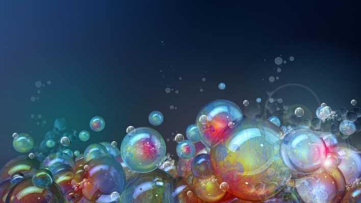 Bunte Seifenblasen, ein dunkelblauer Hintergrund (Quelle: imago / Ikon Images)